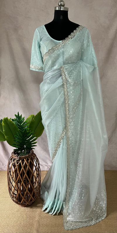 Light blue soft tissue organza designer saree with stitched blouse