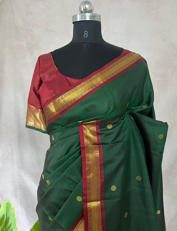 Bottle Green and marron Kanchivaram saree with stitched blouse