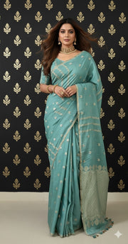 Pastel blue designer tussar georgette saree with meenakari weave , stitched blouse