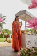 Coral color crepe silk top with flared bottom