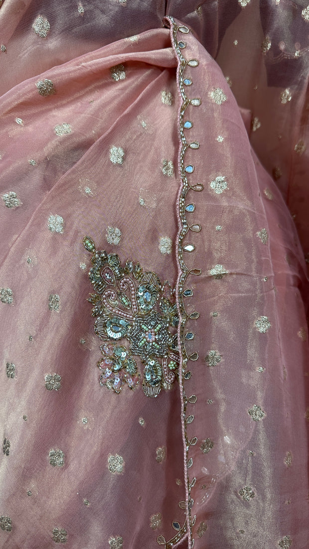 Peach Tissue silk saree with hand emroidery and contract blouse
