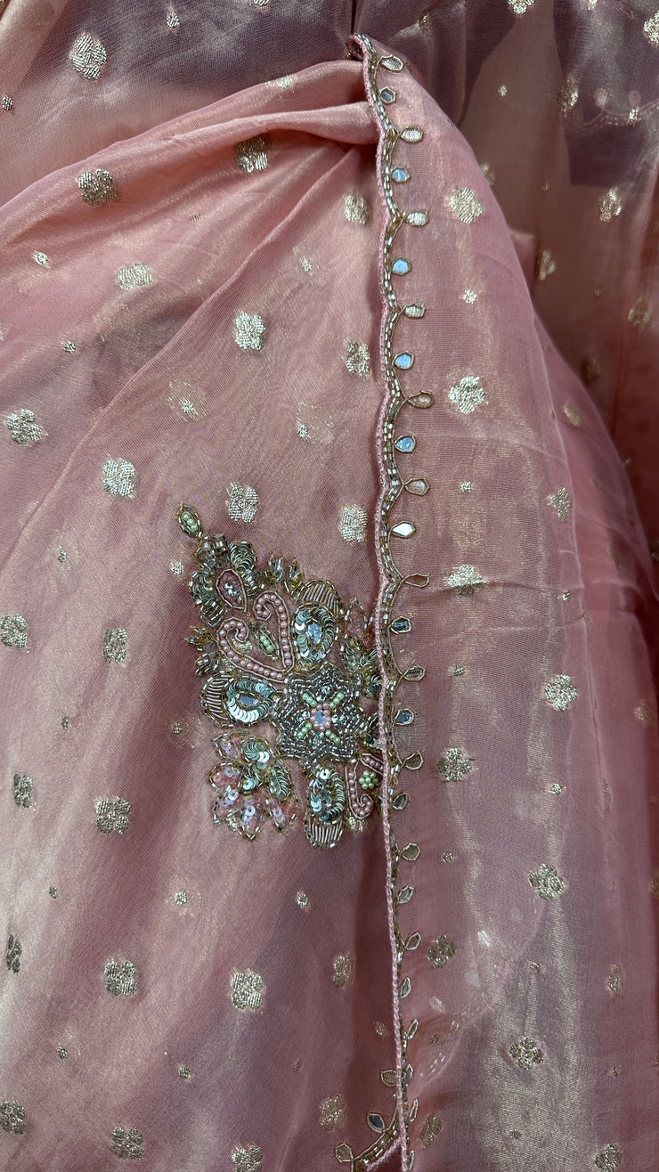 Peach Tissue silk saree with hand emroidery and contract blouse