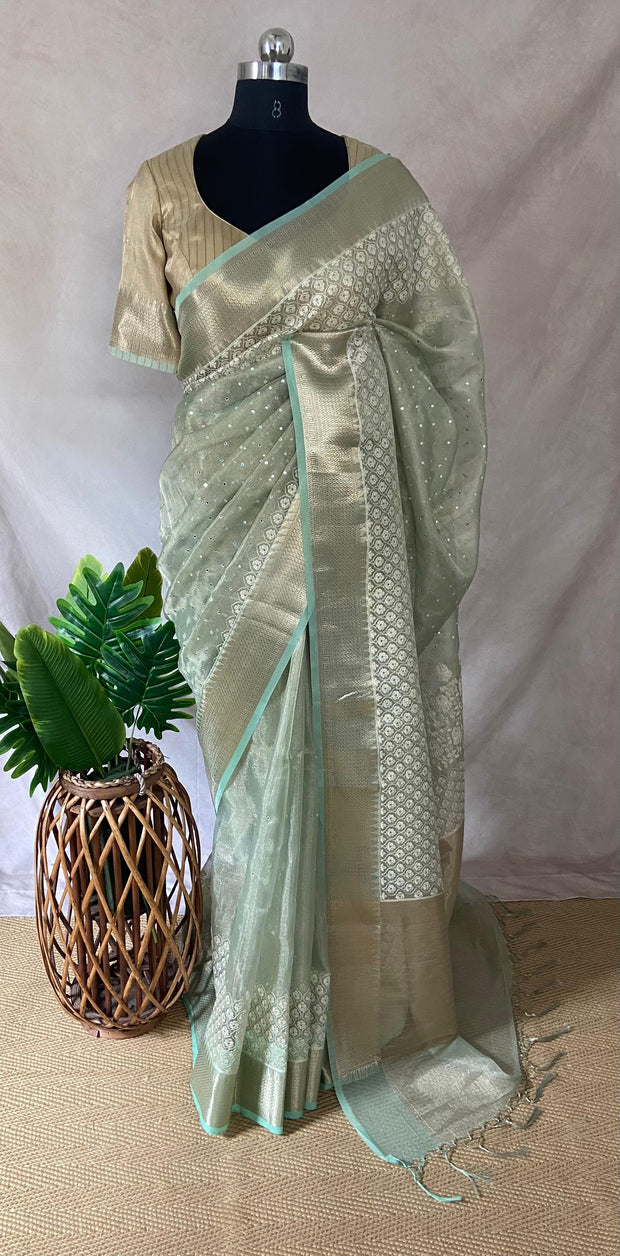 Light green Tissue Kotta silk saree with mirror and chikankari work, with stitched blouse