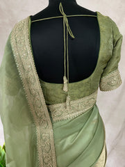 Green organze tissue saree with stitched blouse