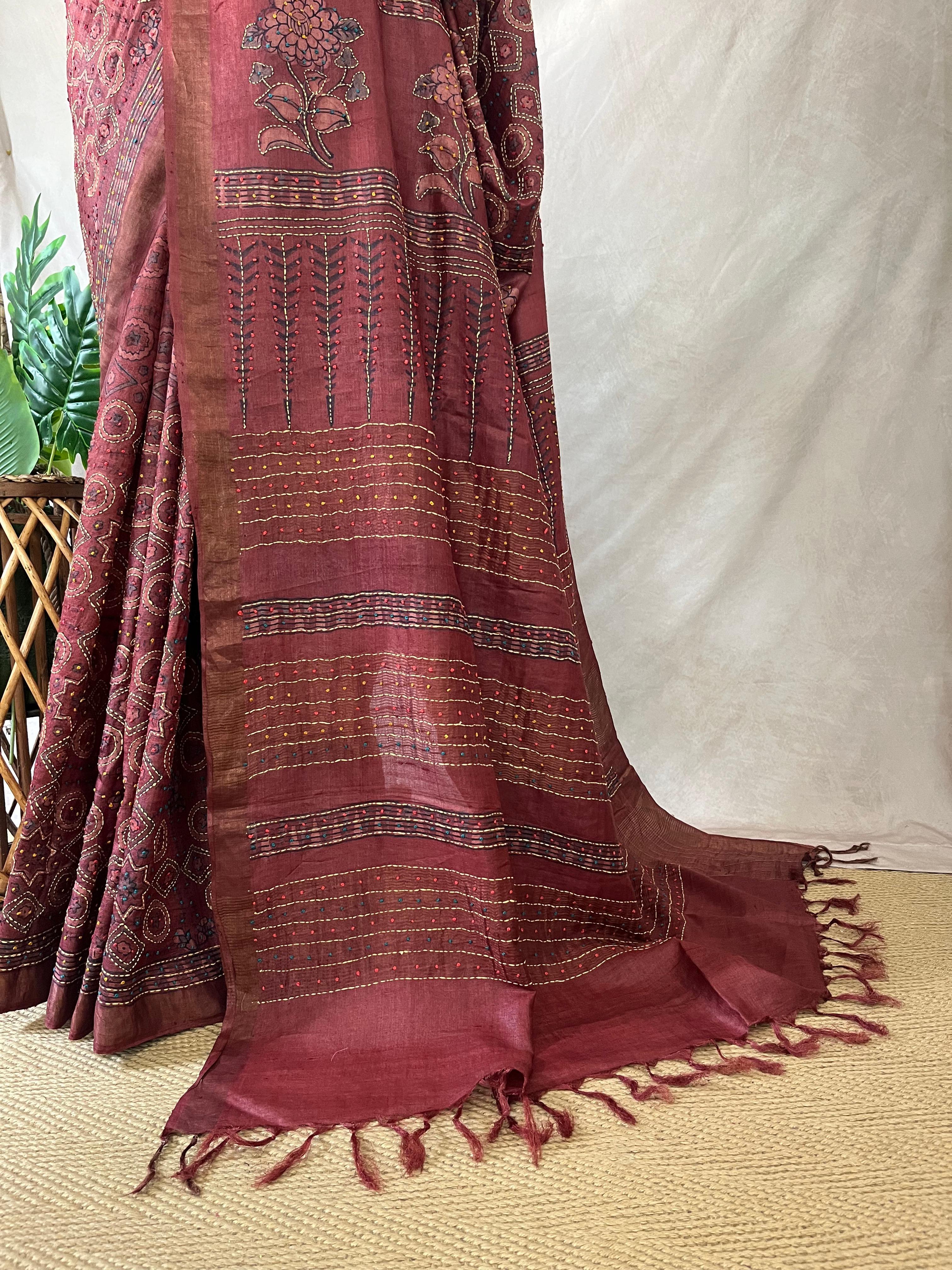 Pure tussar silk saree with Ajrakh hand block printed and high lighted with kanta work and stitched blouse