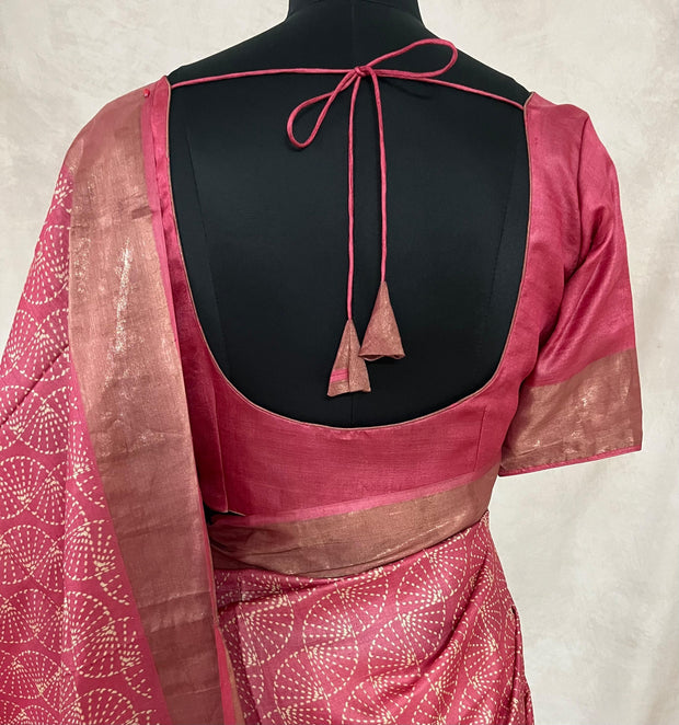 Coral pink print pure tussar silk saree with stitched blouse