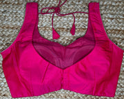 Pink sleeveless blouse