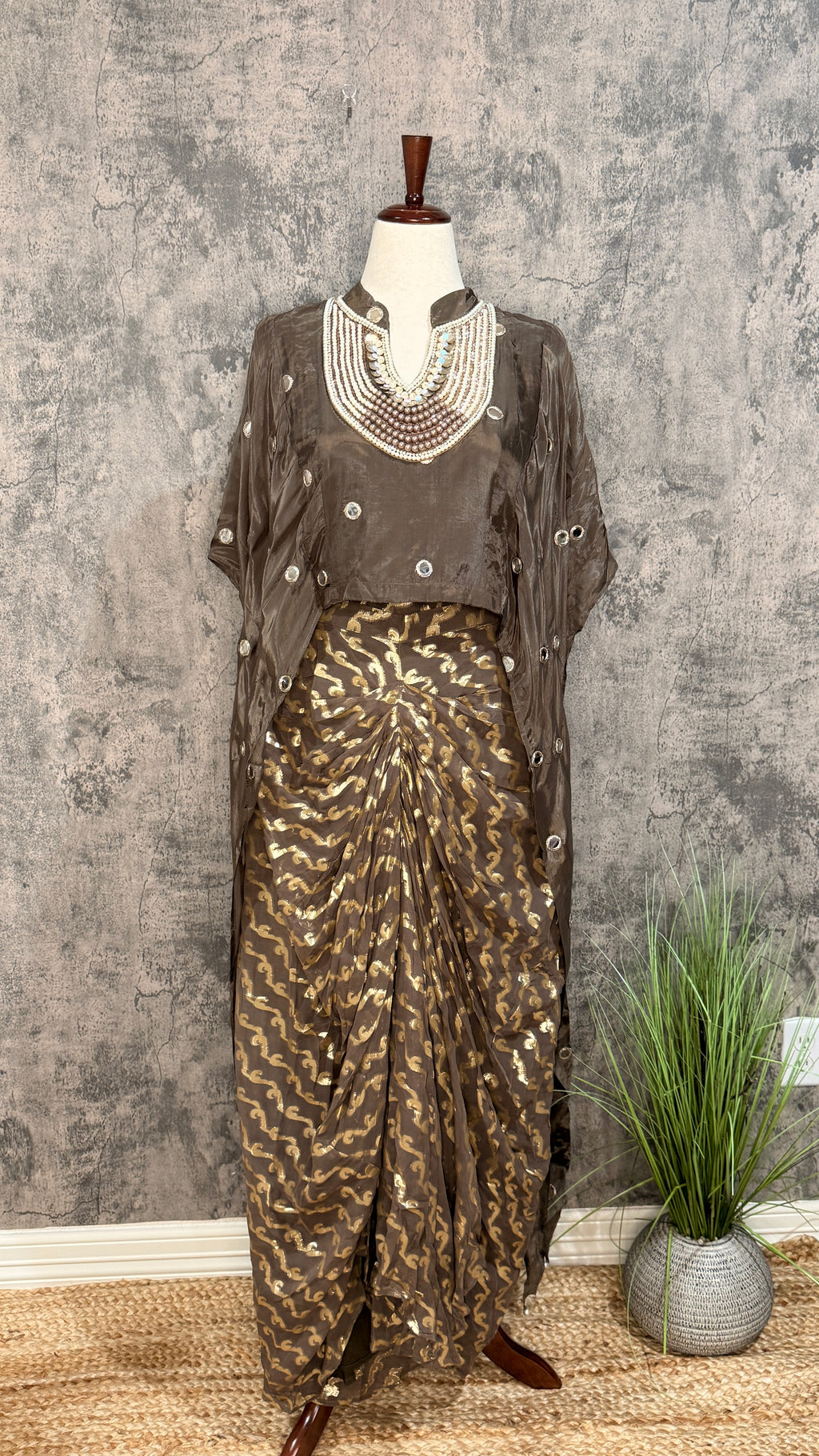 designer top with drape skirt