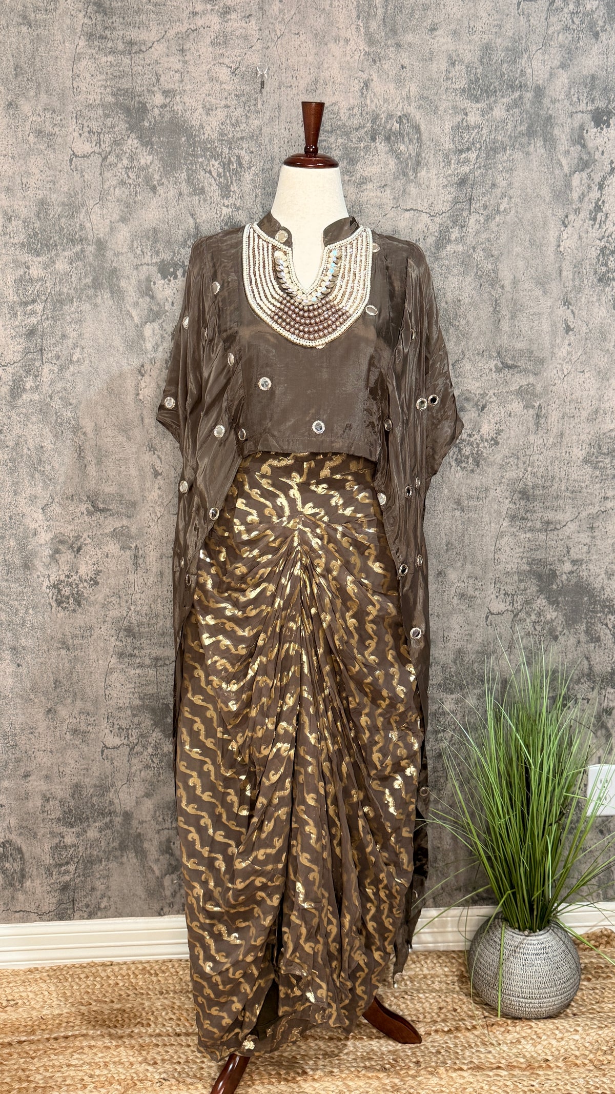 designer top with drape skirt