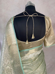Light green Tissue Kotta silk saree with mirror and chikankari work, with stitched blouse