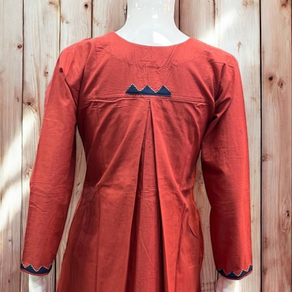 Orange cotton kurti with mirror and handwork, and bottom