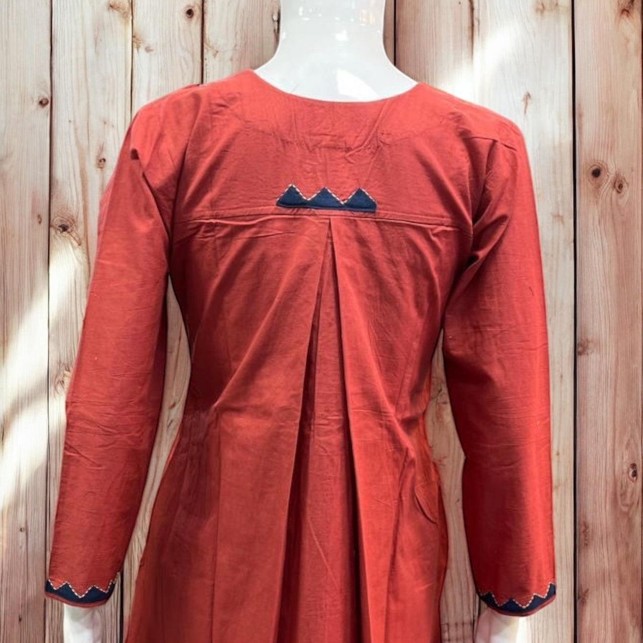 Orange cotton kurti with mirror and handwork, and bottom