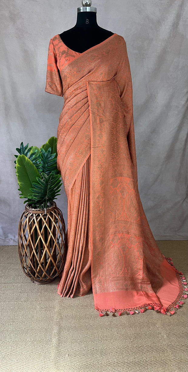 Pure Crepe silk saree with antique zari weave, stitched blouse