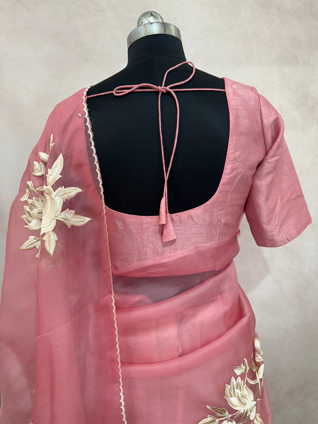 Dusty pink organza saree with thred embroidery and stitched blouse