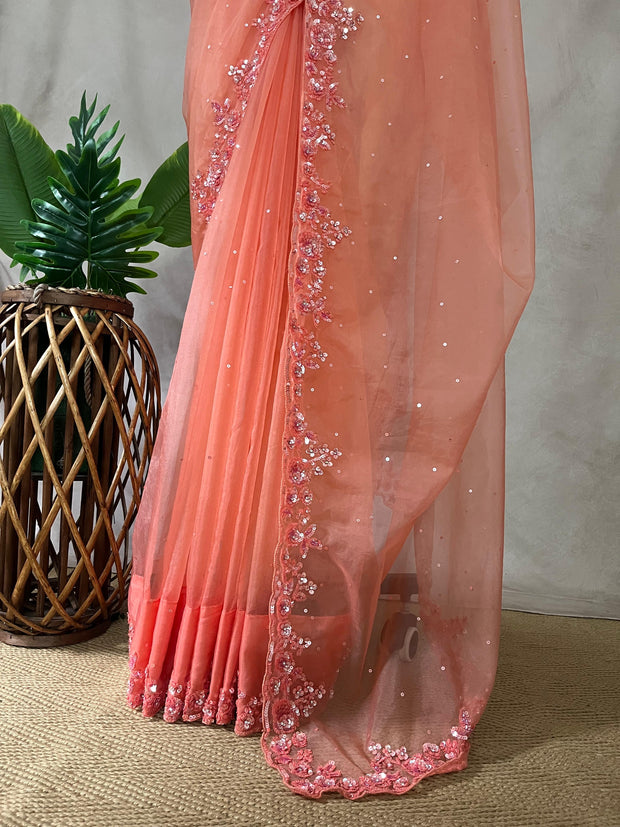 Soft Organza peach color saree with sequins work and stitched blouse