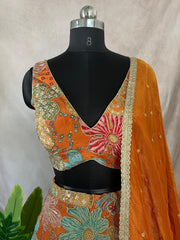 Orange tissue lehanga with work