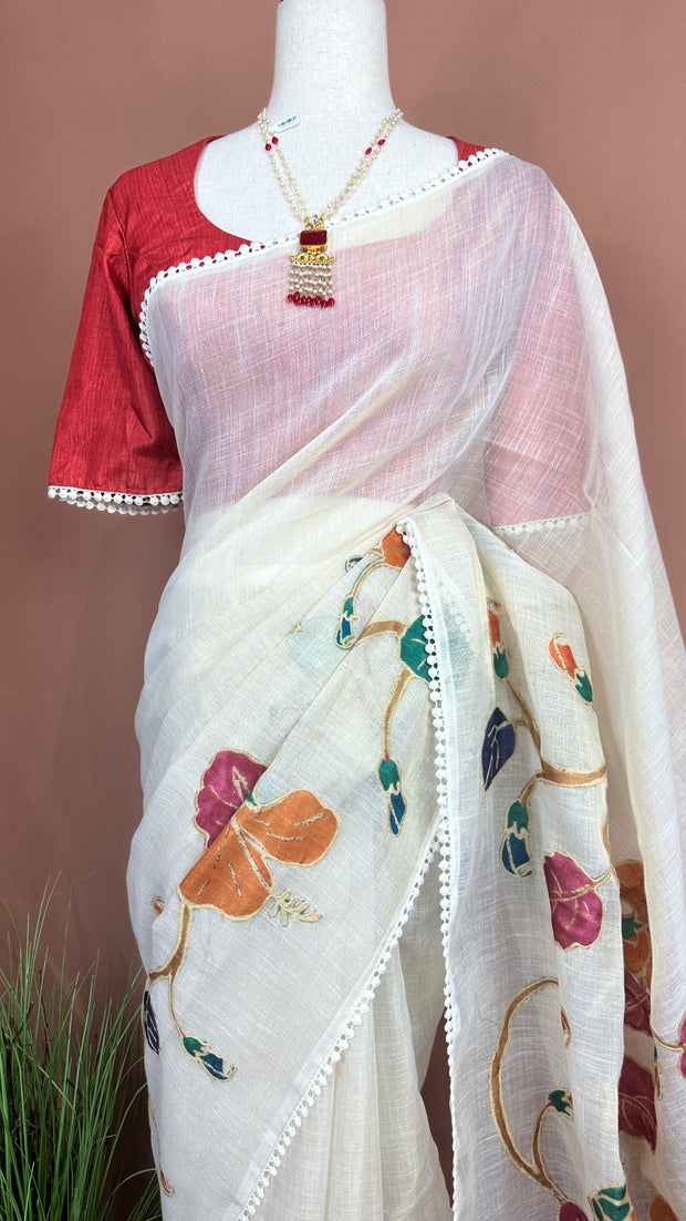 Tissue linen saree with kamalkari patch work, with contrast blouse