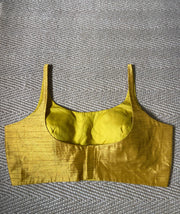 Yellow sleeveless blouse