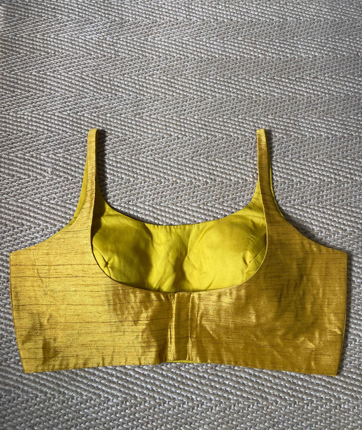 Yellow sleeveless blouse