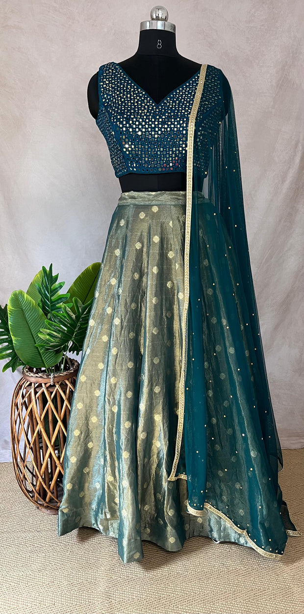Peacock blue tissue silk lehanga with mirror work blouse
