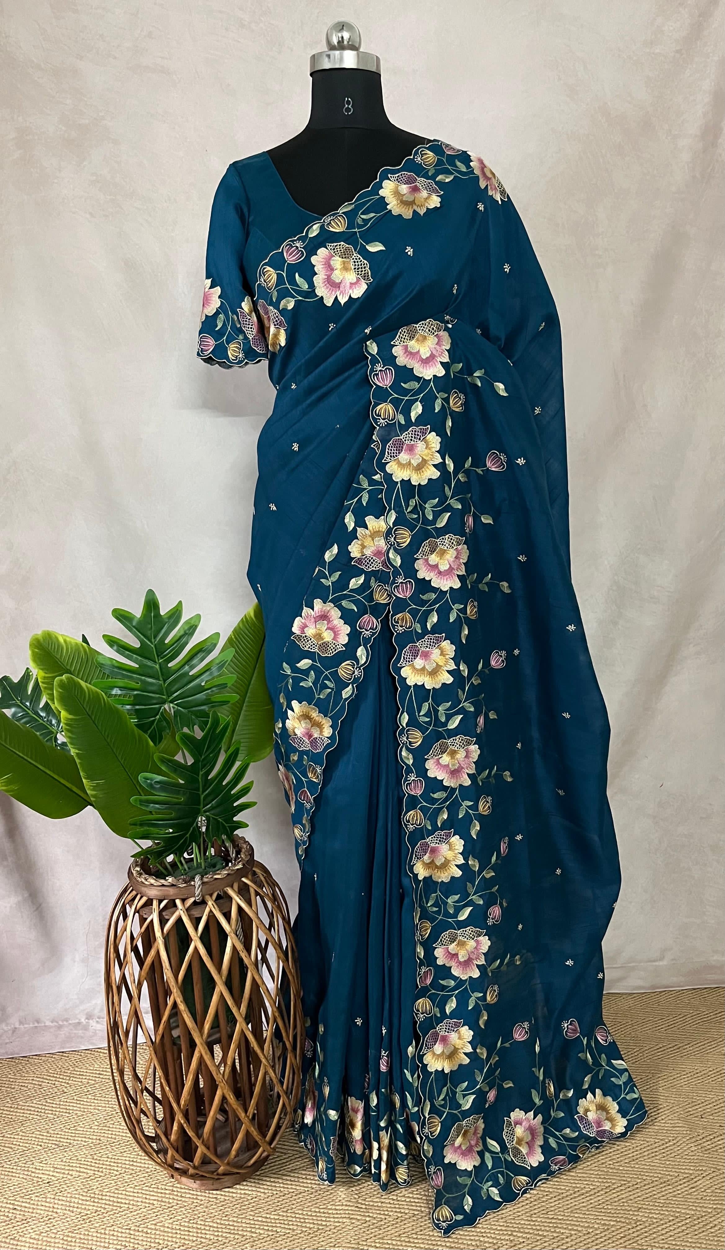 Cobalt blue semi tussar silks aree with emroidery , with stitched blouse