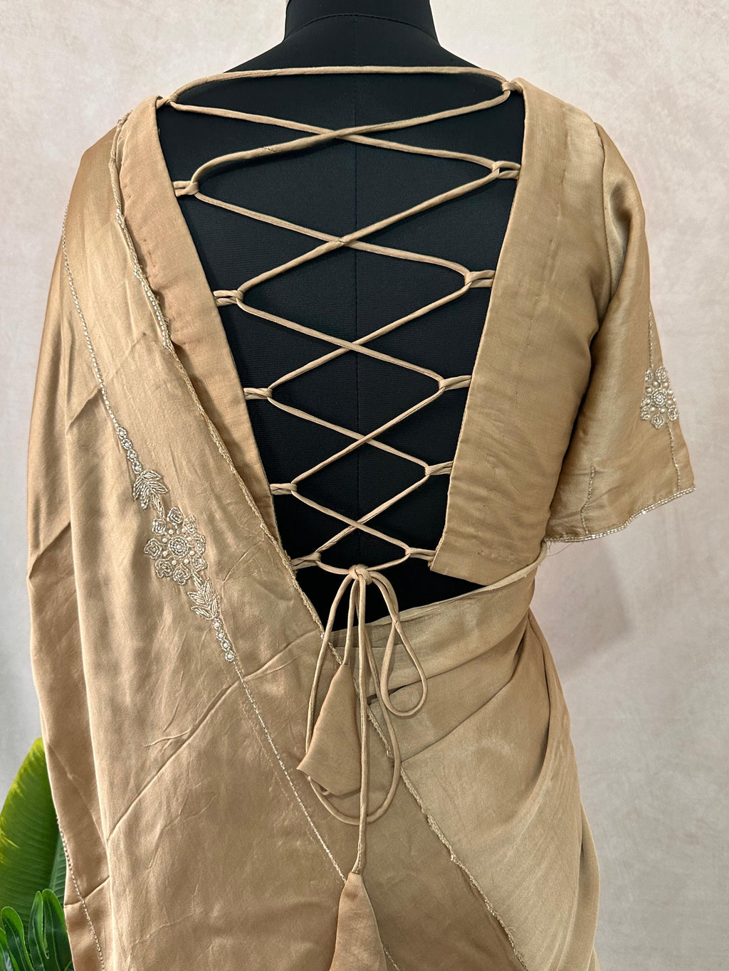 Modal silk saree with hand embroidery and stitched blouse