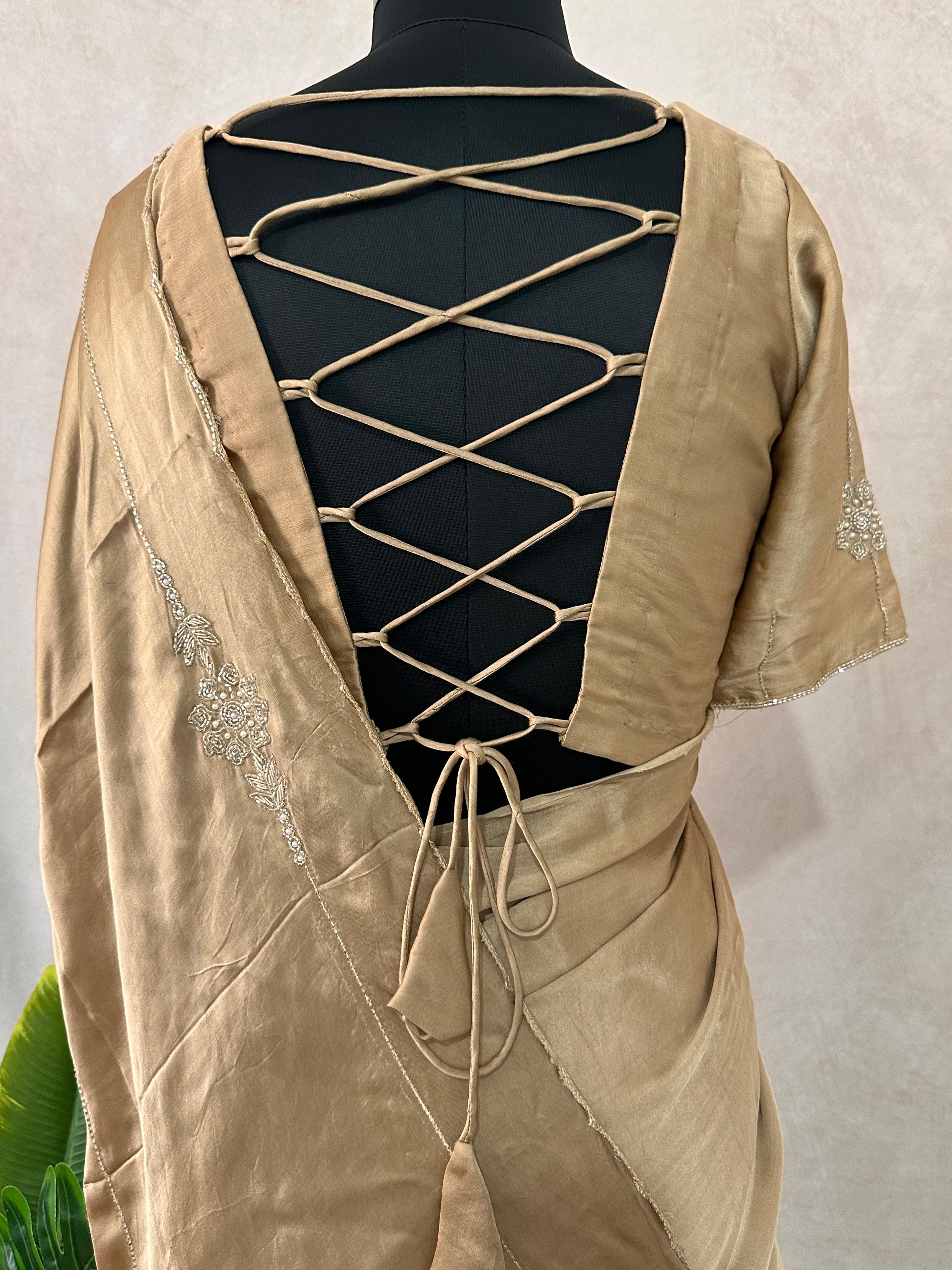 Modal silk saree with hand embroidery and stitched blouse