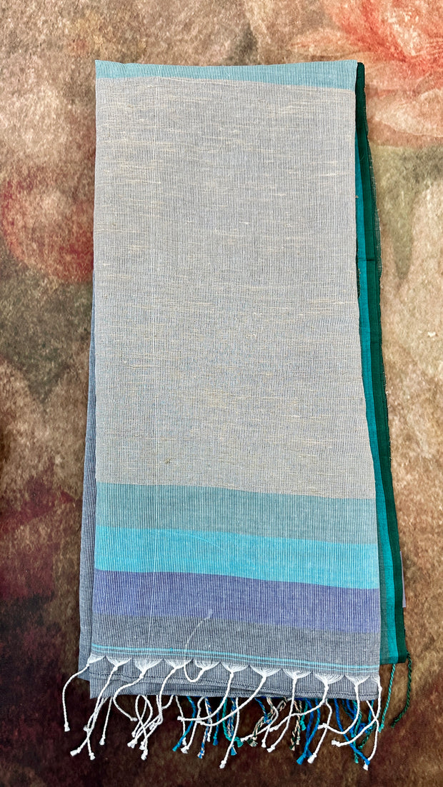 Grey cotton saree, with ikkat silk designer blouse