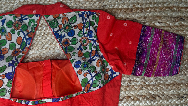 Orange blouse with kalamkari and kanta patch work