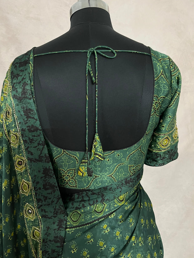 Green modal silk saree with hand work and stitched blouse