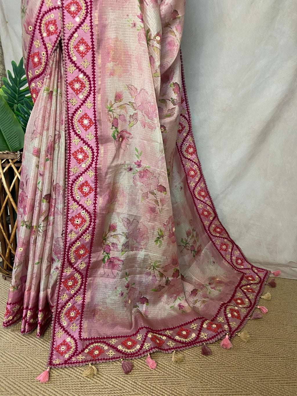 Tissue kotta saree with kutch work border and stitched blouse