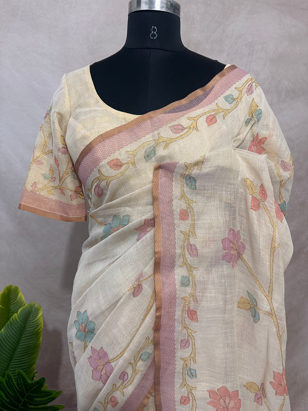 Printed Tissue linen saree with thread work, and stitched blouse
