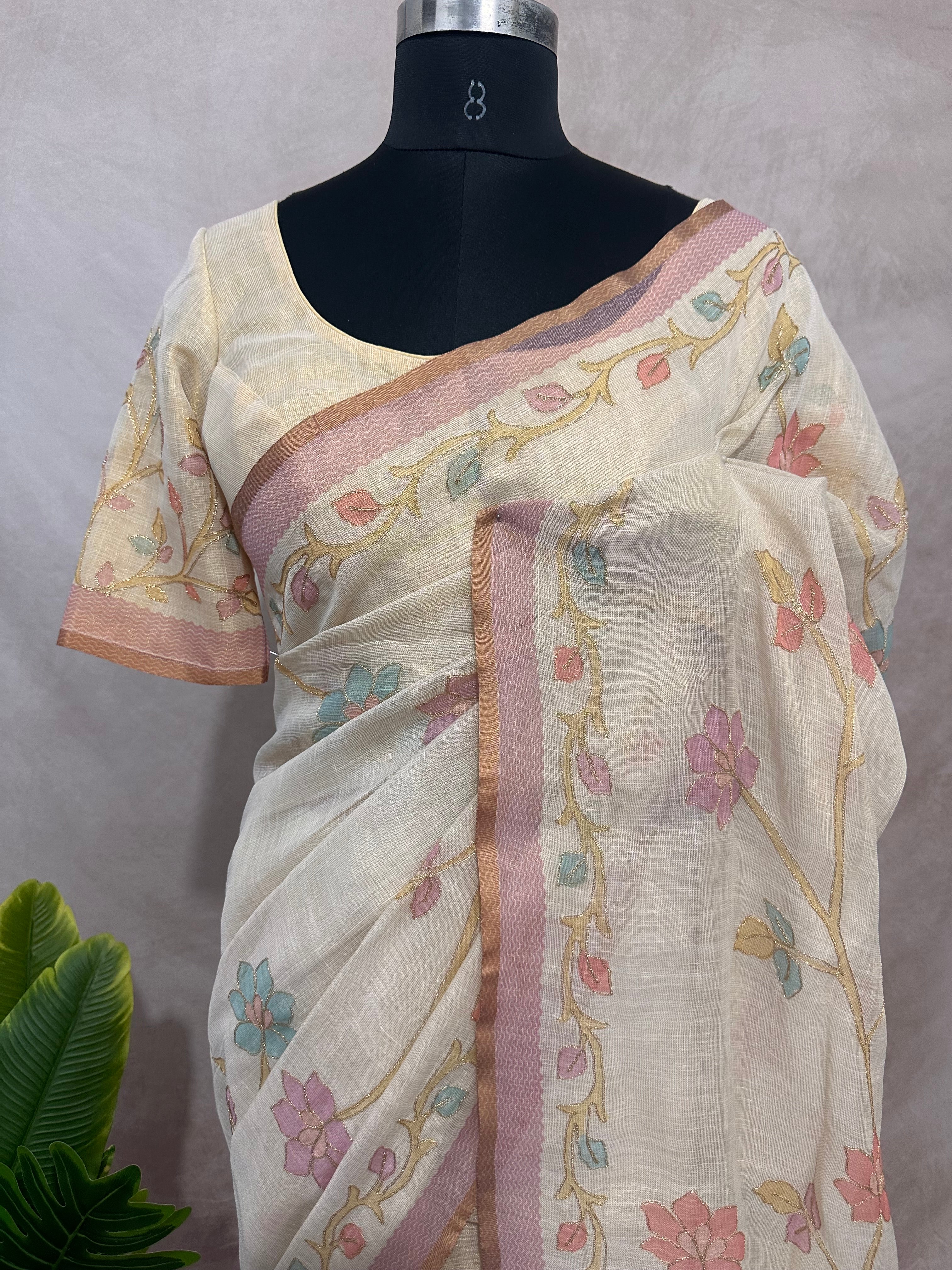 Printed Tissue linen saree with thread work, and stitched blouse