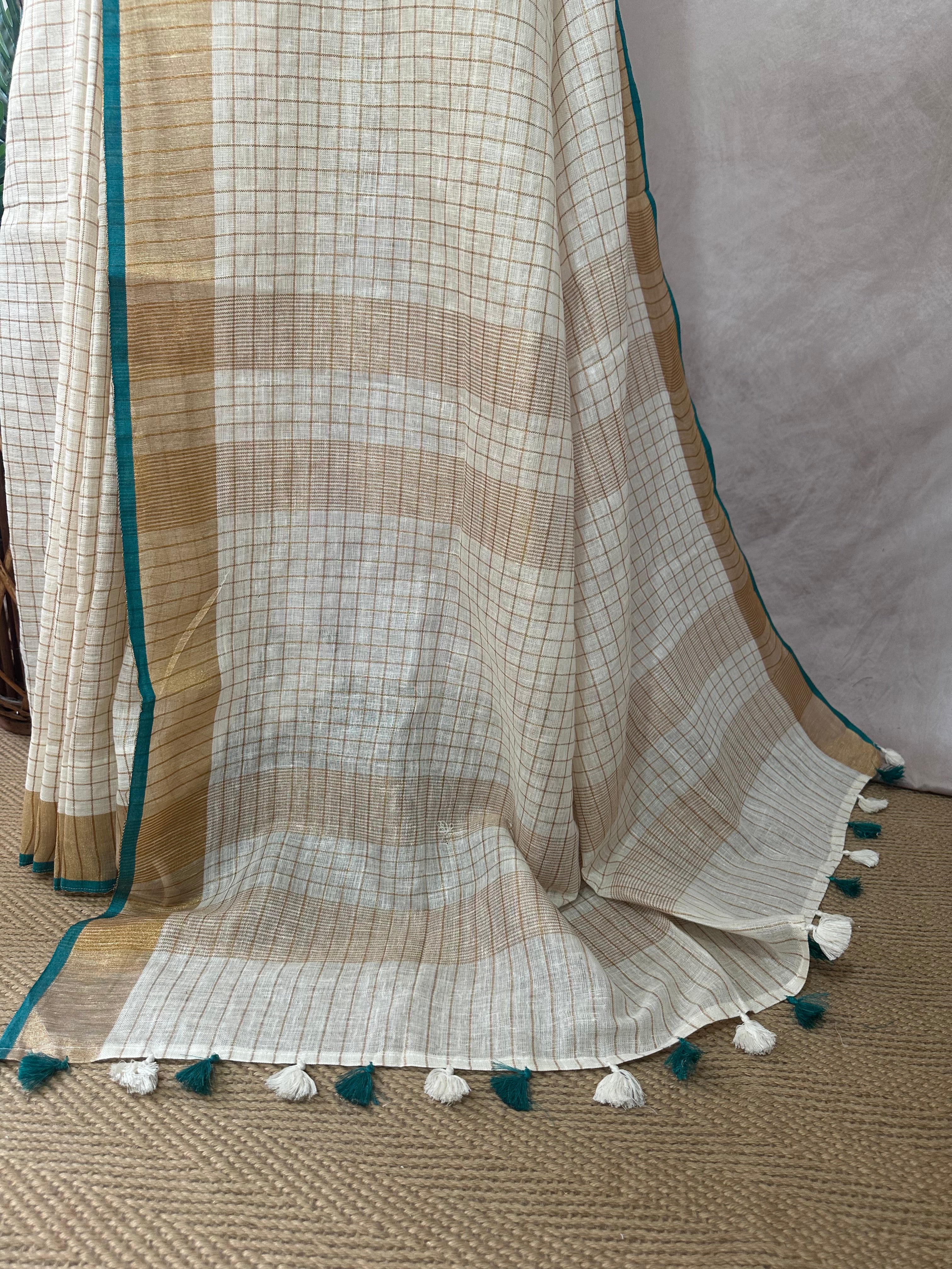 Linen saree with small chck and green border