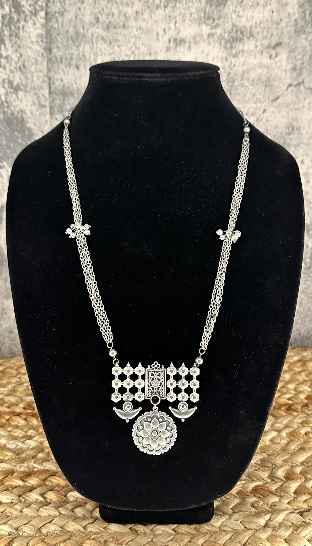Silver replica necklace and earring - with red stone
