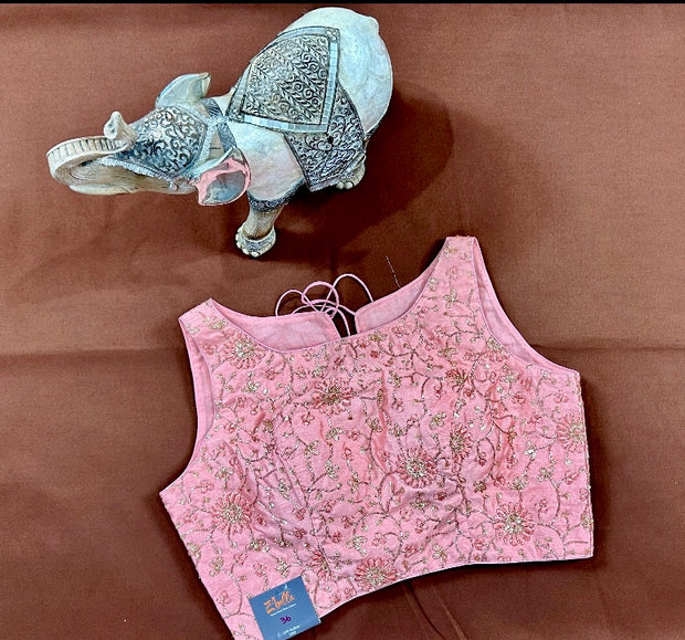 Peach semi silk sleeveless blouse with emroidery