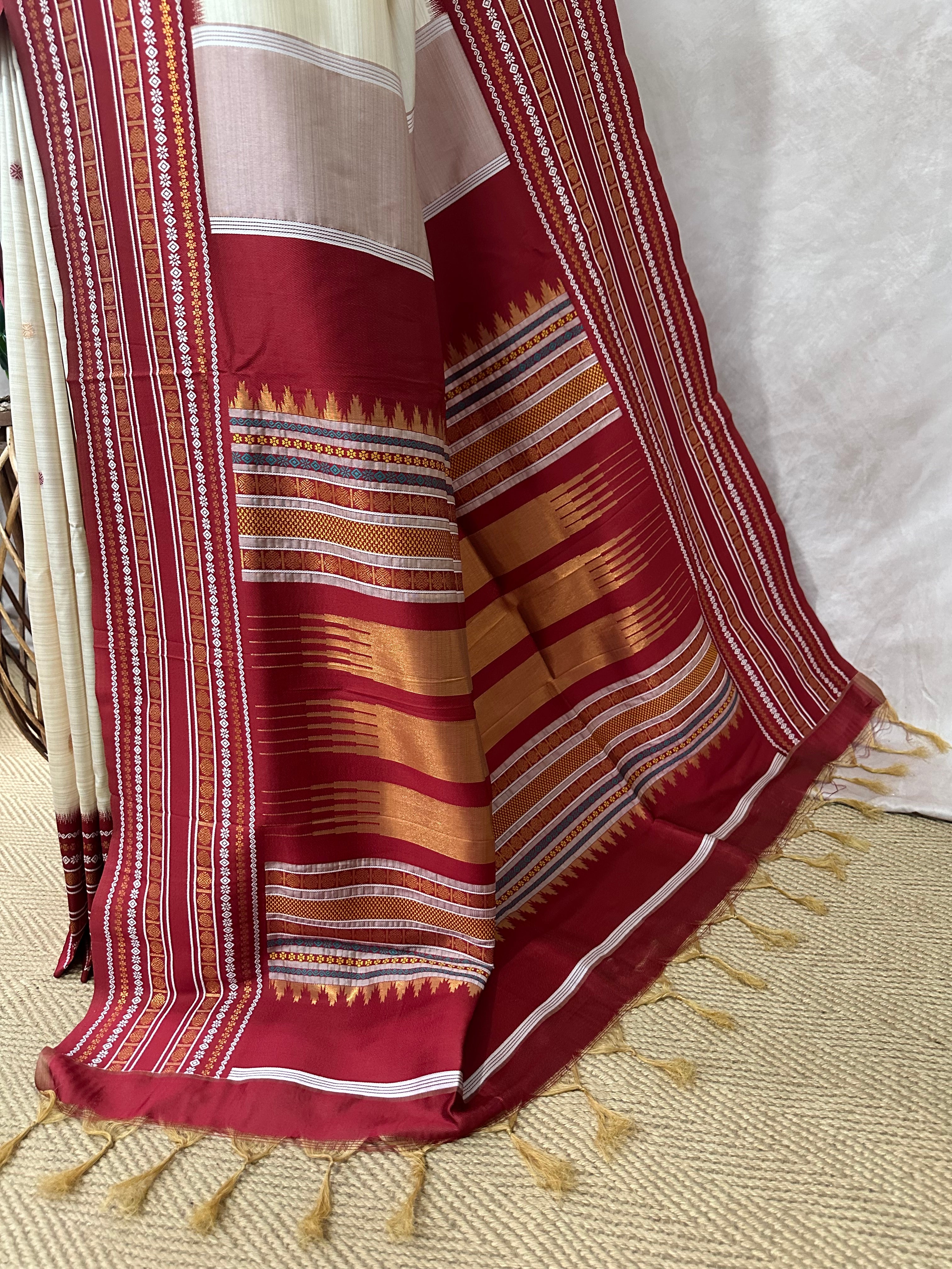 Asam silk saree with Red broder and stitched blouse