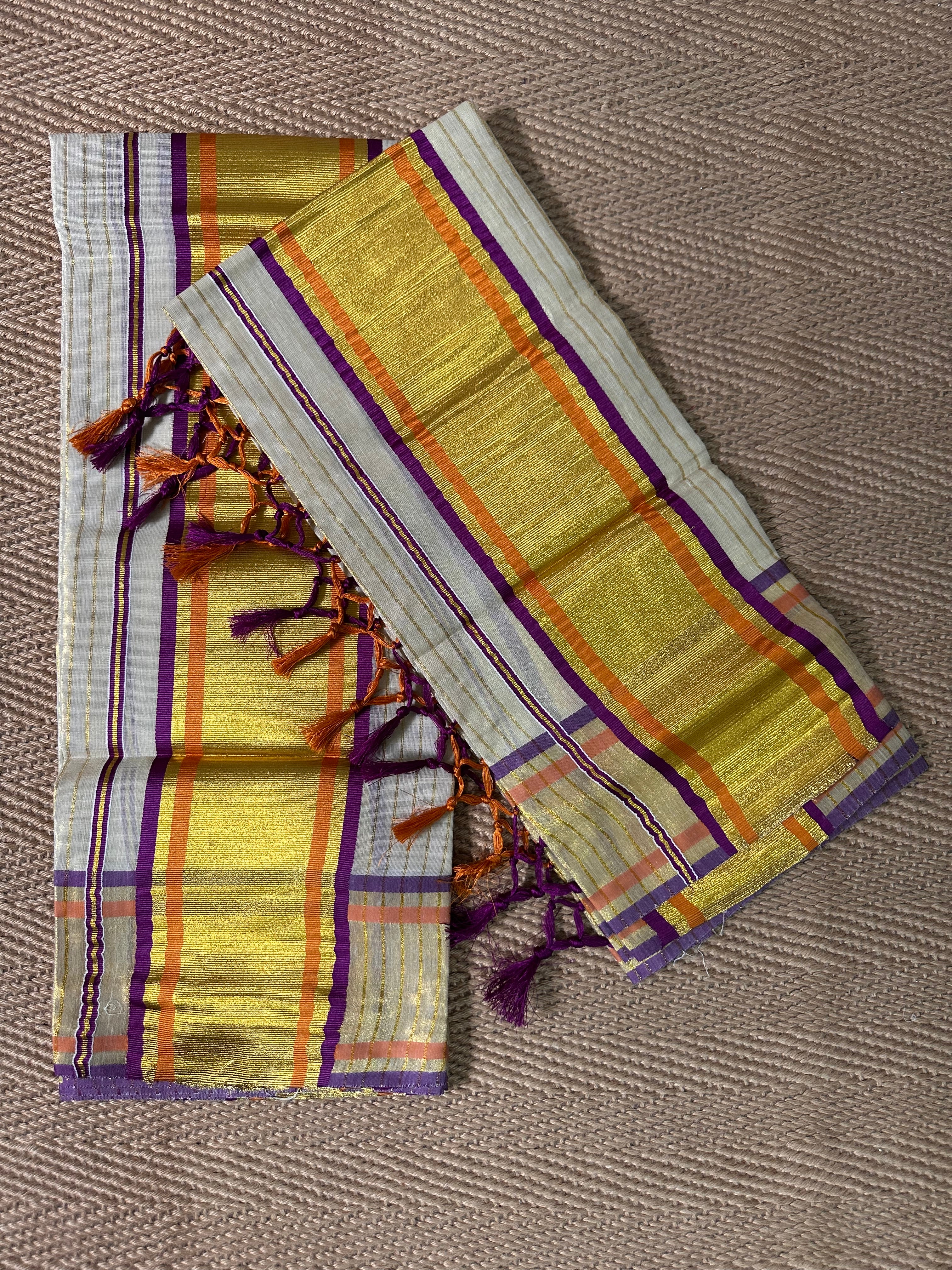 Purple and orange border tissue set mundu with gold stripes