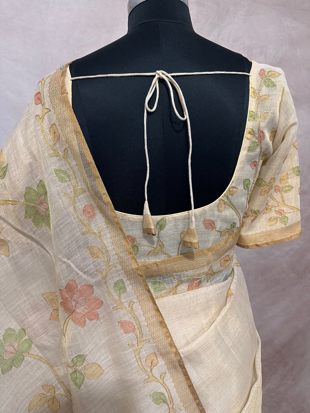 Printed Tissue linen saree with thread work, and stitched blouse