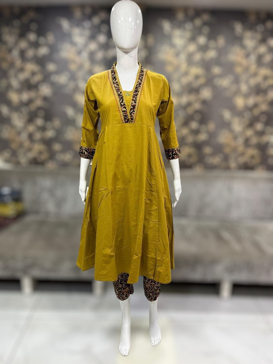 Mustard yellow cotton kurti with handwork on back neck, includes bottoms