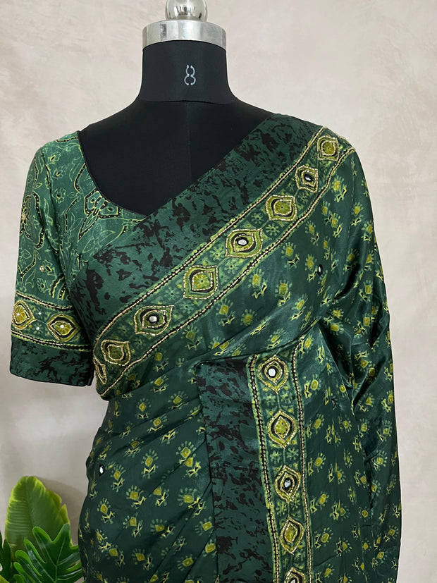 Green modal silk saree with hand work and stitched blouse