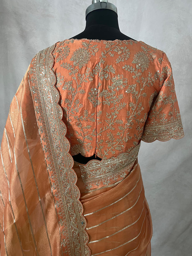Orange Tissue oraganza saree with designer blouse