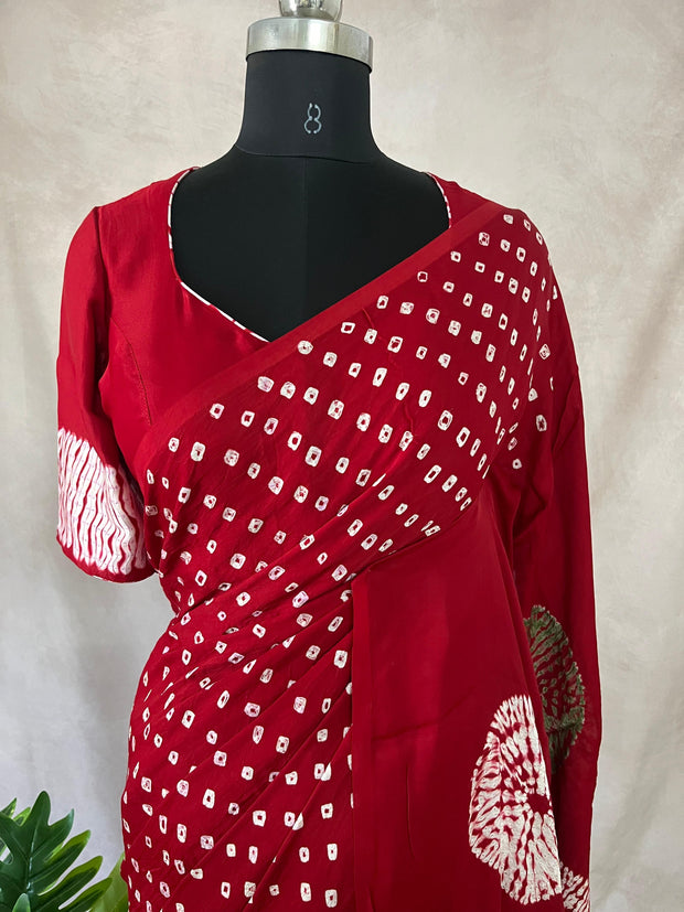 Red gajji silk saree with hand bandini and stitched blouse