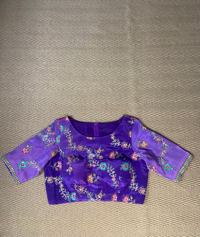 Purple blouse with multi color print and highlighted with threadwork