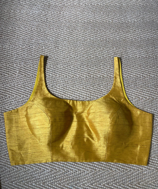 Yellow sleeveless blouse