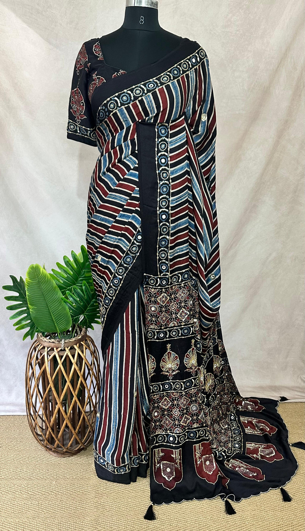 Designer Ajrakh modal silk saree with bead and mirroer handwork, stitched blouse
