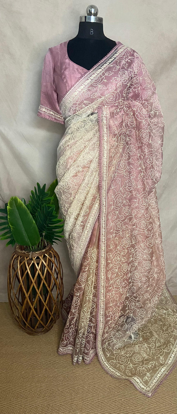 Pink Organza saree with embroidery and stitched blouse