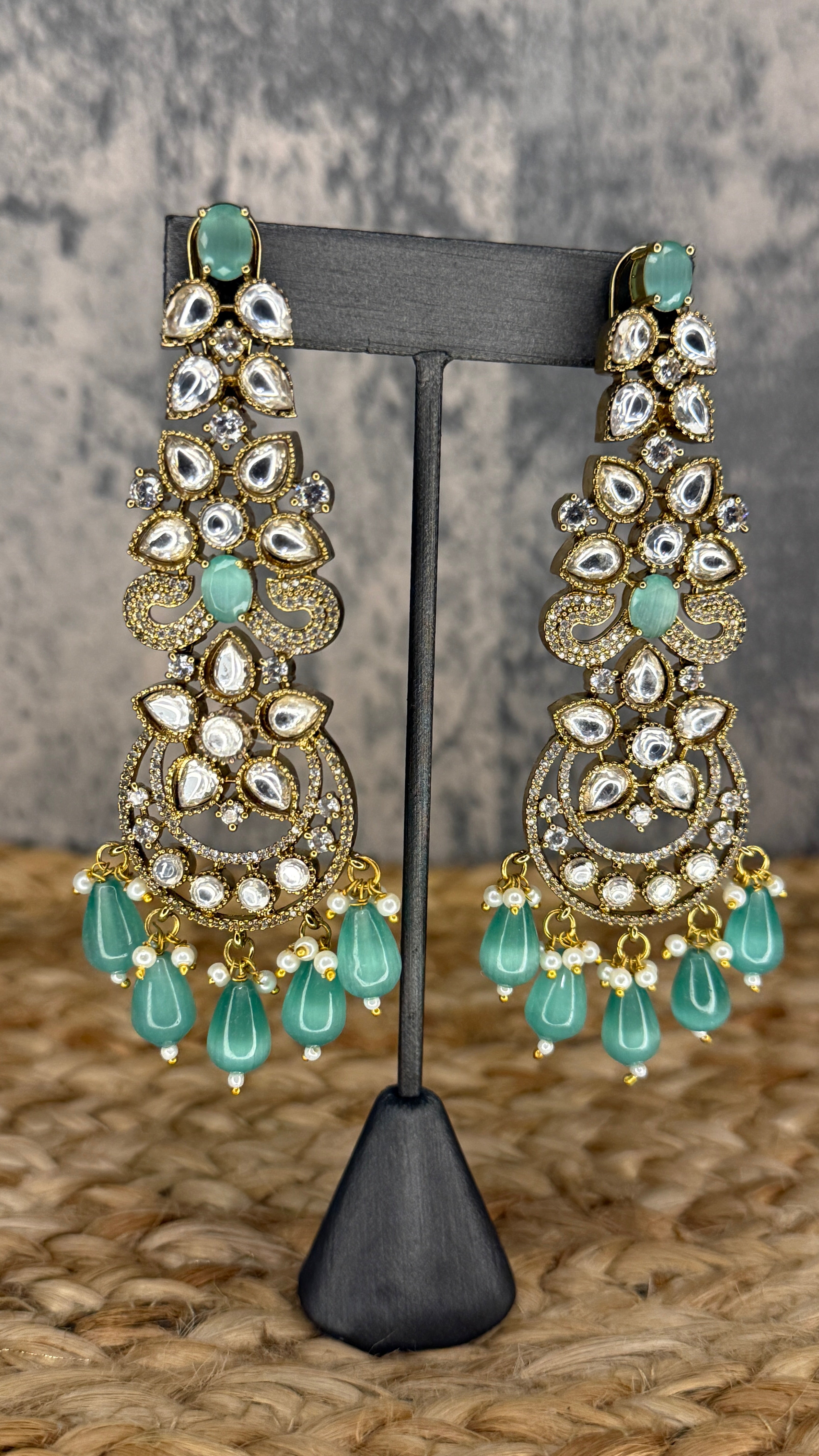 Designer replica earring with light green and moissanite stone
