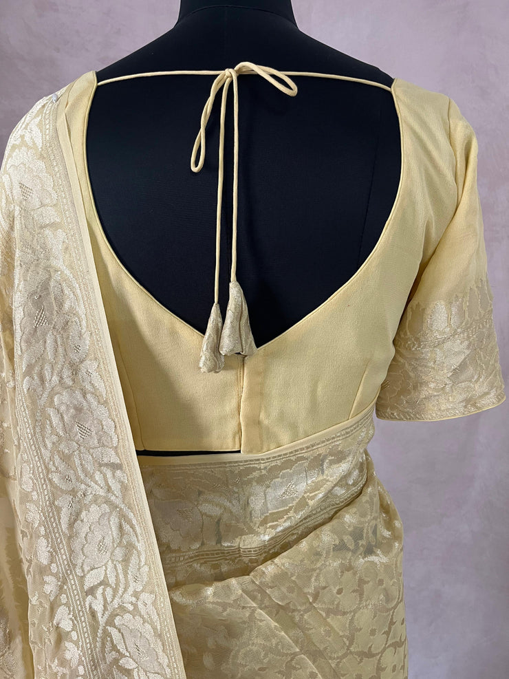 Light yellow pure Geogette silk saree with stitched blouse