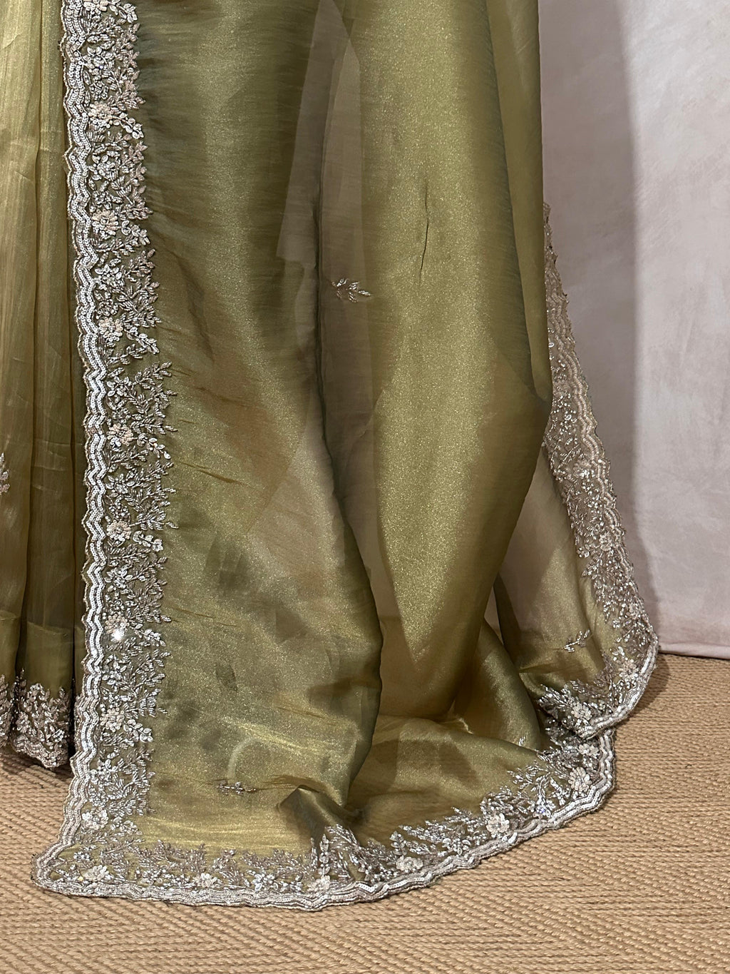 Olive green Green tissue designer saree with stitched blouse and under skirt